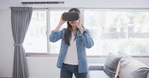 woman wear virtual reality headset and touch something