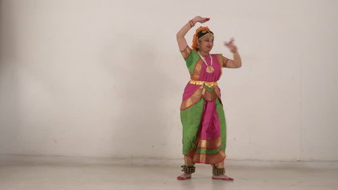 Indian girl performing traditional Bharat Natyam.