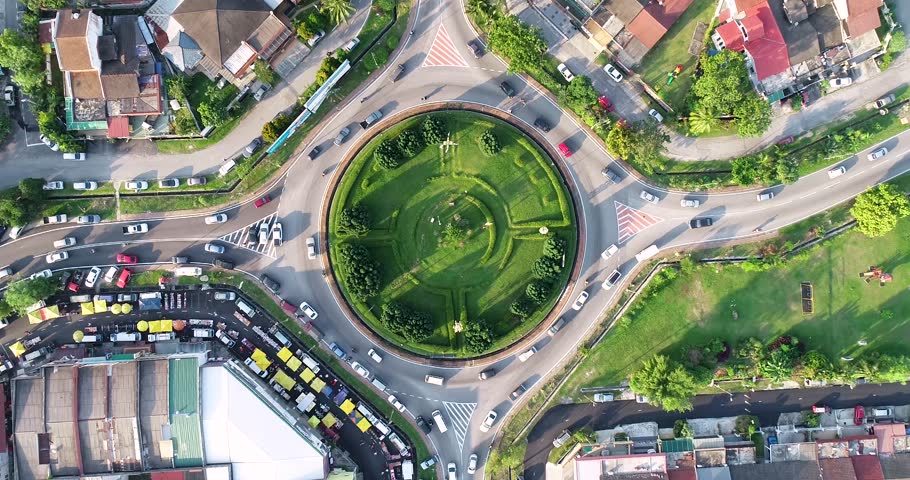 Kuala Lumpur, Malaysia - Drone flying above roundabout  Royalty-Free Stock Footage #1013327903
