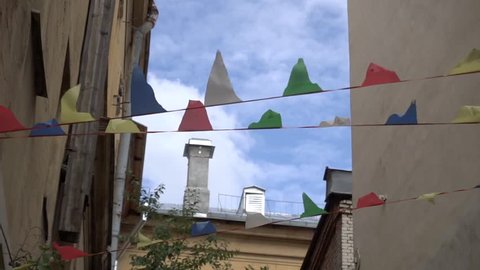 Tibetan flags in the European city courtyard