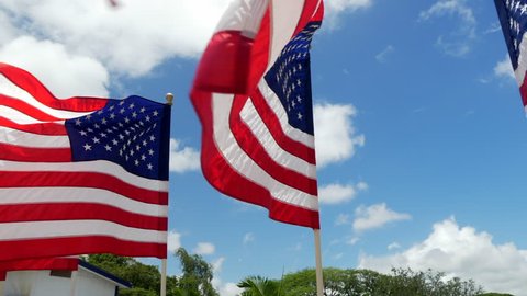 American Flags flowing in the wind at Pearl Harbor in Oahu, Hawaii. 