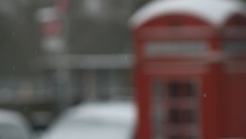 london telephone box snow winter