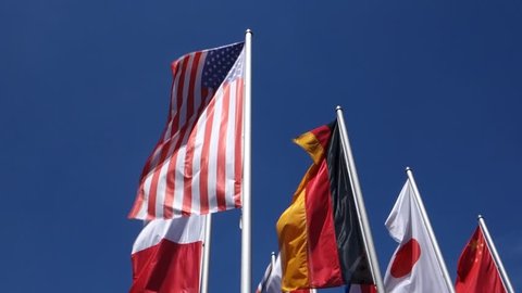 National flags: Flag of the United States, Flag of Germany, Flag of Japan.
