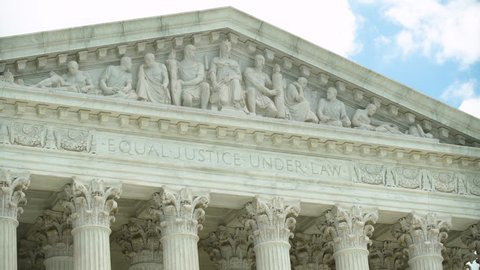 Pediment and architrave of Supreme Court's west entrance, with the inscription "Equal Justice Under Law".