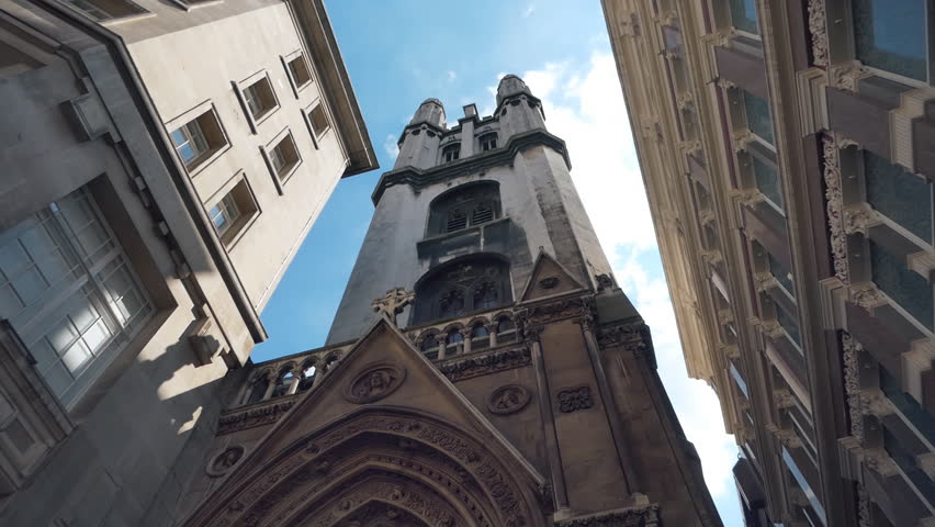 Low angle view of the ancient tower of the church.