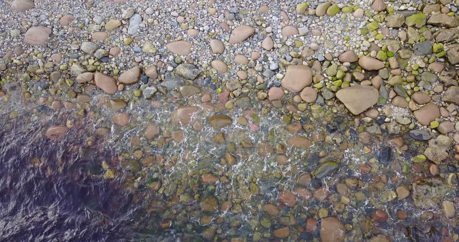 Top down aerial view over a rocky cove in Acadia National Park, Maine. 