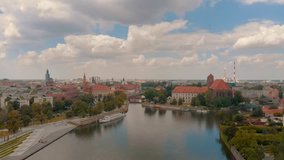 Aerial view on Ostrów Tumski in Wroc?aw, Poland. City park, Odra river, cathedral, old town / 4K Drone Video
