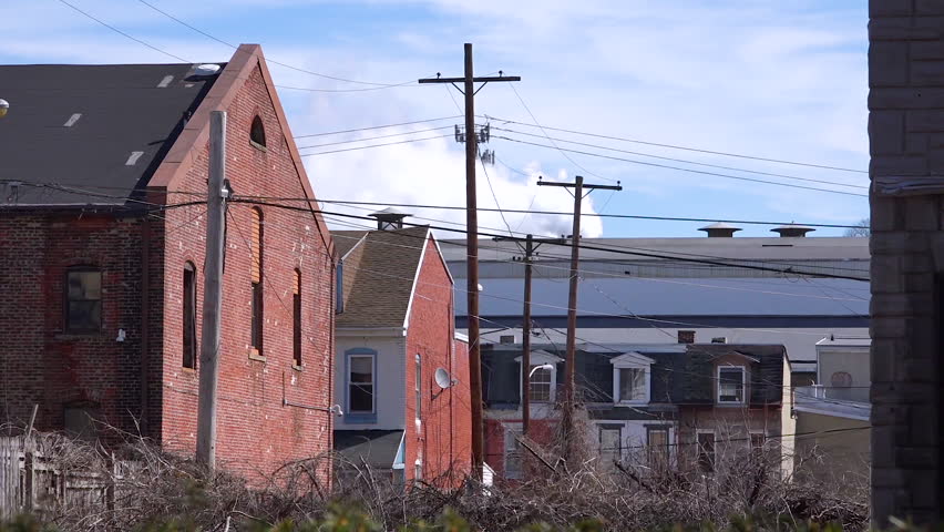 READING, PENNSYLVANIA - CIRCA 2017 - An establishing shot of apartments in an industrial warehouse district of Reading, Pennsylvania.
