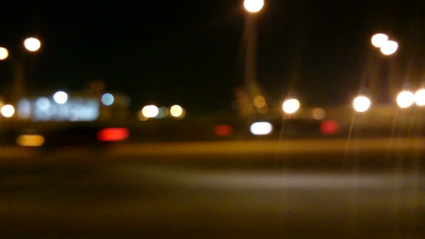 Defocused night time city driving plate shot on streets of Miami