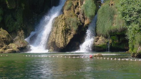The greenest lush vegetation with amazing waterfalls and lake