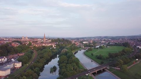 An aerial shot of the rivers running through Exeter at sunset