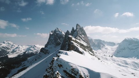 Aerial flight over The Dolomites, Italy in winter. Filmed in 4k.