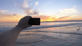 Professional video series of POV taking selfie photo on beautiful sunset in California in 4K in Slow motion 60fps