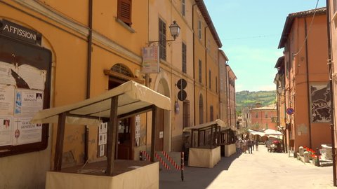 BRISIGHELLA (RA), ITALY - JUNE 2, 2018: tourists are walking in street of ancient medieval village