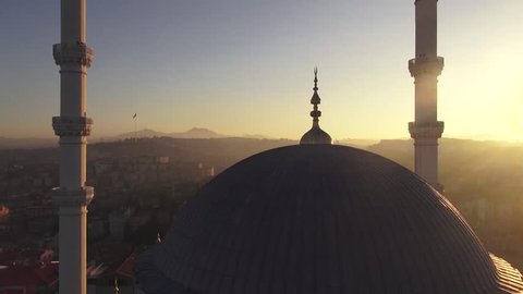 Mosques and minarets at sunset
