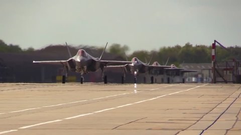 CIRCA 2017 - F-35s are driven down a runway in the UK.