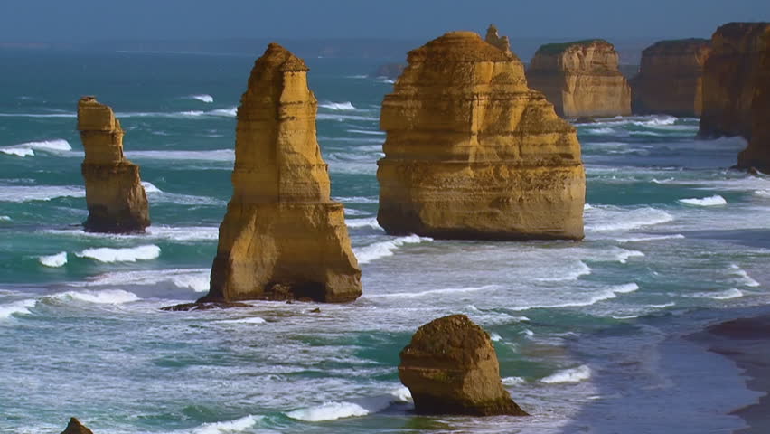 AUSTRALIA - CIRCA 2017 - Establishing shot of the 12 Apostle rock formations along the Great Ocean Road of Victoria, Australia.
