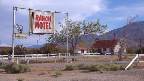 USA - CIRCA 2017 - An abandoned or rundown old Ranch motel along a rural road in America.