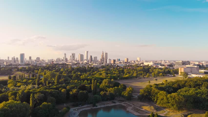 Pola Mokotowskie Warsaw Park with lake and city aerial view Royalty-Free Stock Footage #1013432243