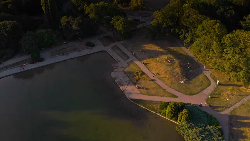 Pola Mokotowskie Warsaw Park with lake and city aerial view Royalty-Free Stock Footage #1013432249