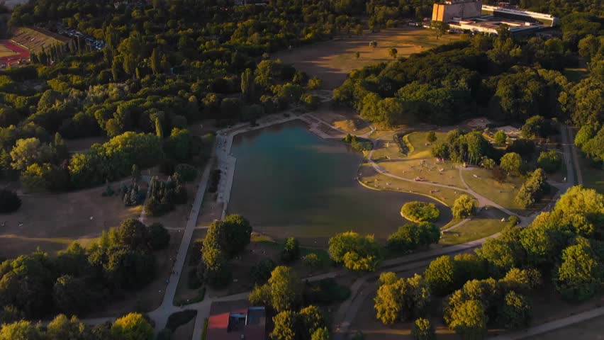 Pola Mokotowskie Warsaw Park with lake and city aerial view Royalty-Free Stock Footage #1013432261