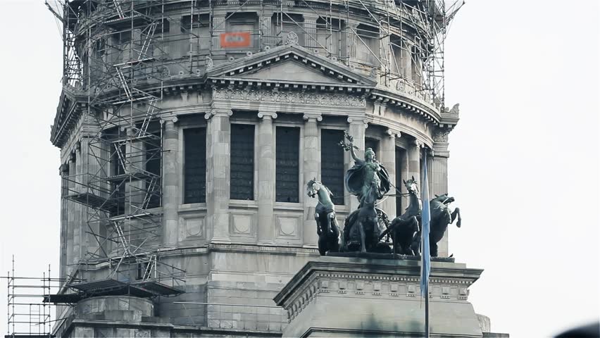 Quadriga of Victory in the National Congress of Argentina (Congreso) with Scaffolding Structure and Argentina Tangled Flag, Buenos Aires, Argentina. Zoom In.