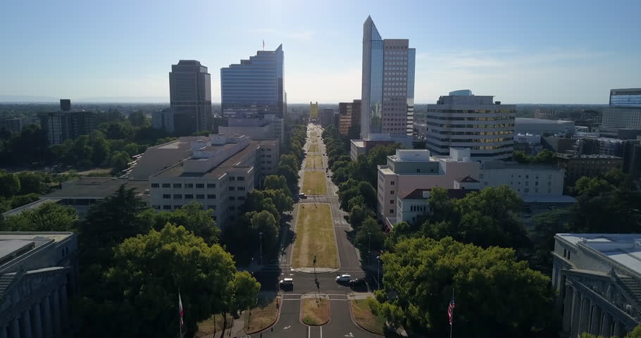 Aerial shot of the capital mall in Sacramento moving down the street towards the Tower Bridge.