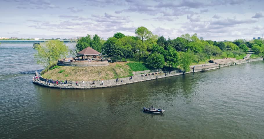 AERIAL: Flying over the St Lawrence river and Parc De Dieppe, Montreal Canada