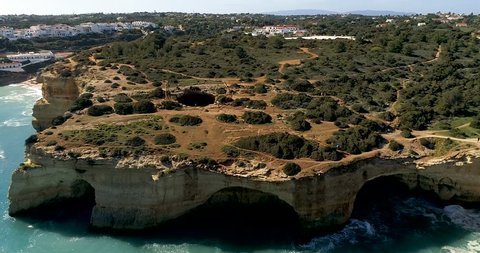 Aerial view of cliffs in Algarve near Benagil Cave Carvoeiro, Portugal   