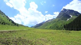 landscape of beautiful summer mountain alps view with cloudy blue sky in  Austria