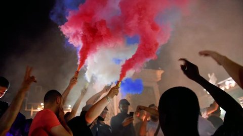 STRASBOURG, FRANCE - JULY 10, 2018: Go France, Allez Les Bleus singing fans after the victory of France qualify for the final of the 2018 FIFA World Cup after their victory over Belgium 1-0