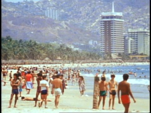 ACAPULCO, 1982, Acapulco beach with crowds and hotels