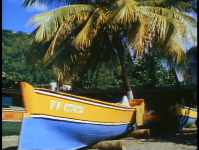 MARTINIQUE, 1982, on the beach, blue and yellow boat with palms