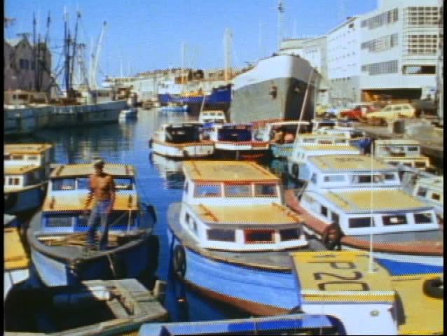 BARBADOS, 1982, marina with colorful blue & yellow painted boats
