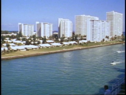 FORT LAUDERDALE, FLORIDA, 1982: Condominiums, Queen Elizabeth 2, POV passing