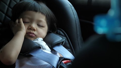 baby sleeping in car seat