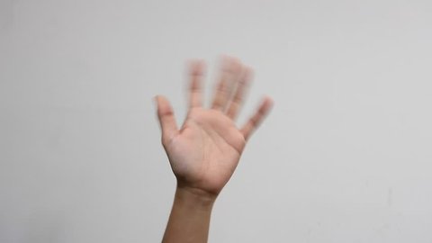 Hand waving, saying goodbye gesture isolated on white background. HD 1080p