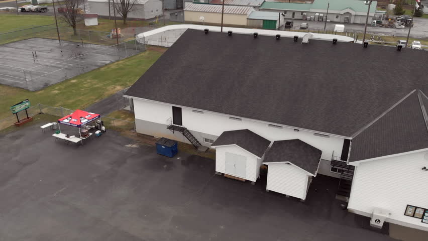 shot over building revealing town and mountains