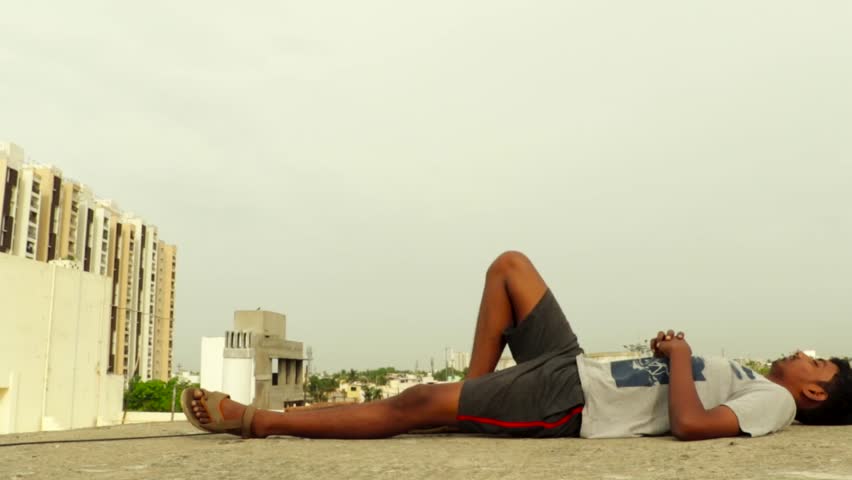 Young man sleeping deeply terrace, 