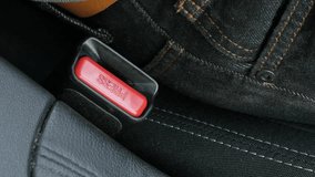 Locking car belt buckle on driver seat 4K video