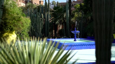 A scenic fountain shot from the Majorelle Garden at Yves Saint Laurent in Marrakech, Morocco.
