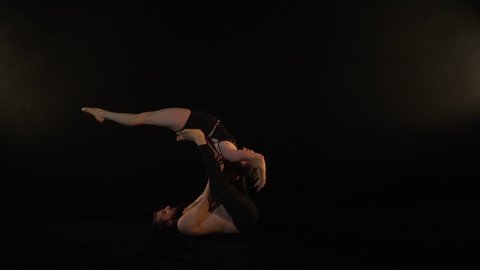 Slow-motion shooting, support in the air on acro yoga