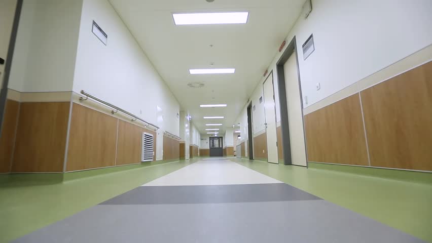 Camera moves above the floor in the hospital corridor | Shutterstock HD Video #1013535074