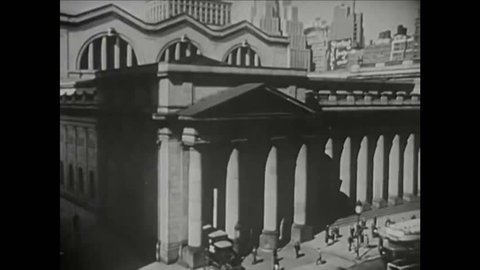 CIRCA 1940 - New York landmarks are shown: Pennsylvania Station, the Empire State Building, the Chrysler Building, and the New York Public Library.