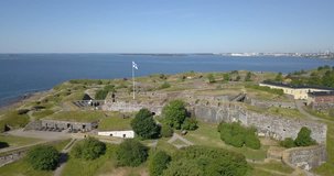 4K high quality summer morning aerial video of Helsinki Baltic Sea Finnish Bay lagoon area, city skyline, Suomenlinna Island with forts and cannons near the capital of Finland Suomi, northern Europe
