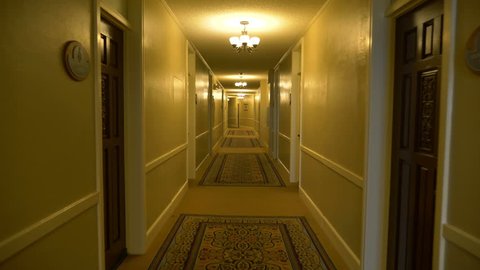Point of view - walking down a hotel hallway