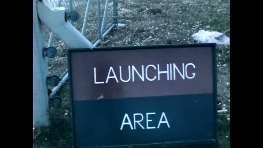 CIRCA 1966 - Men of the US 7th army assemble the components of a Sergeant missile at a launching site.