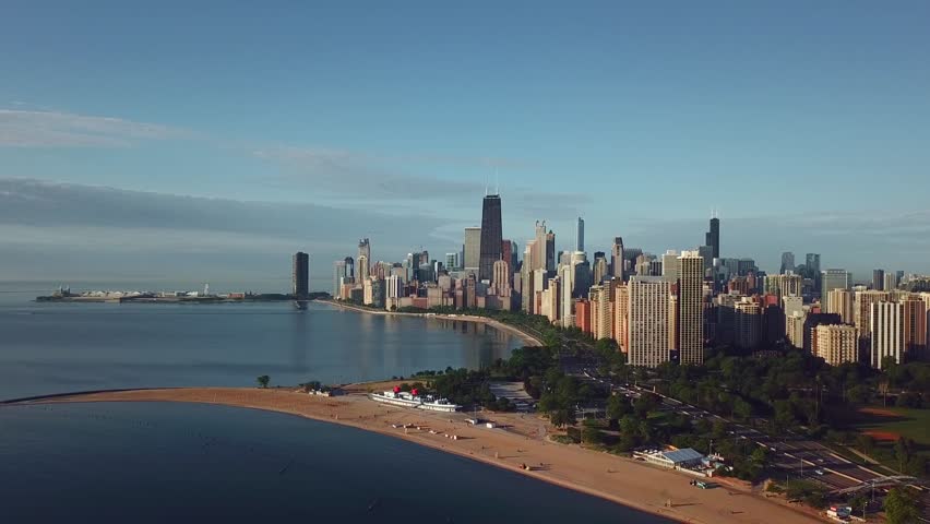 panorama of Chicago from the height and lake Michigan, skyscrapers morning sun