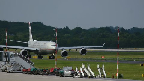 FRANKFURT AM MAIN, GERMANY - JULY 20, 2017: Airbus A340 of Etihad airlines on runway. Airplane is going to take off at Dusseldorf International airport