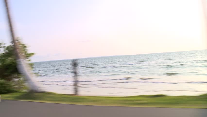 West african tropical sandy coast from a car